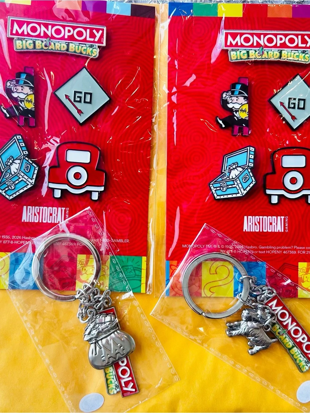 Monopoly Big Board Bucks enamel pins & keychain